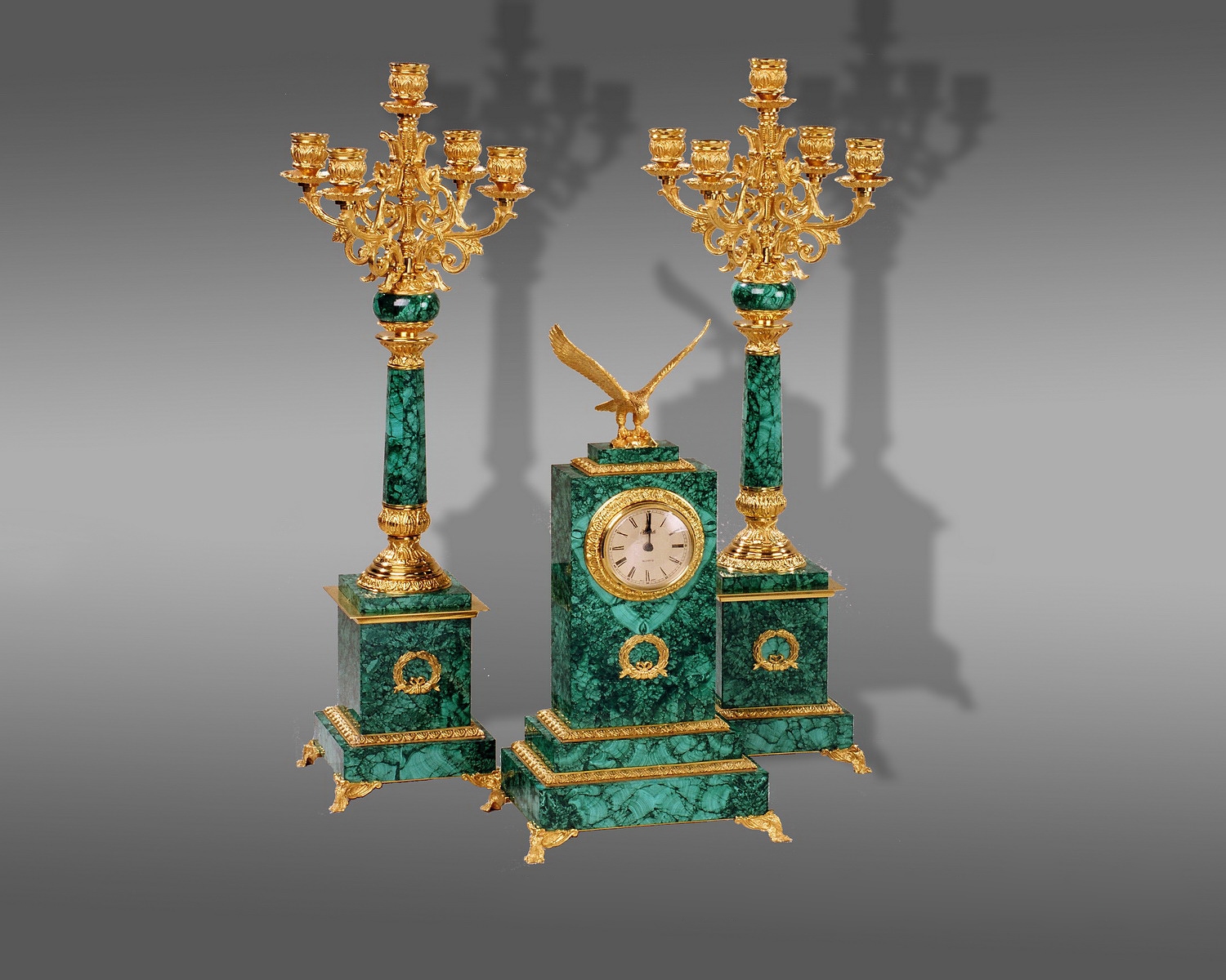 Каминный набор из малахита:  часы и канделябры на пять свечей.